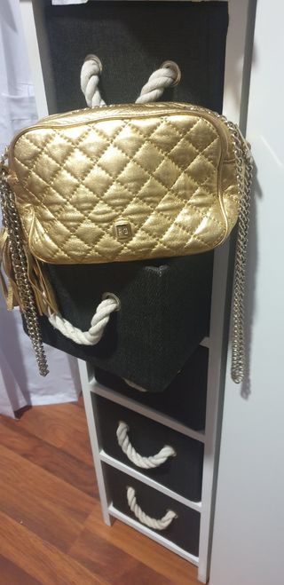 Bolso dorado Purificación Garcia de segunda mano por 30 EUR en Ourense en  WALLAPOP