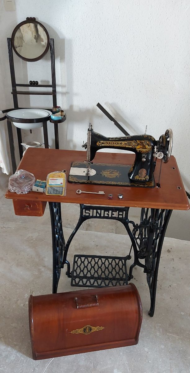 Antigua máquina de coser Singer Una joya