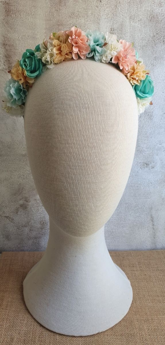 Corona flores salmón y verde agua