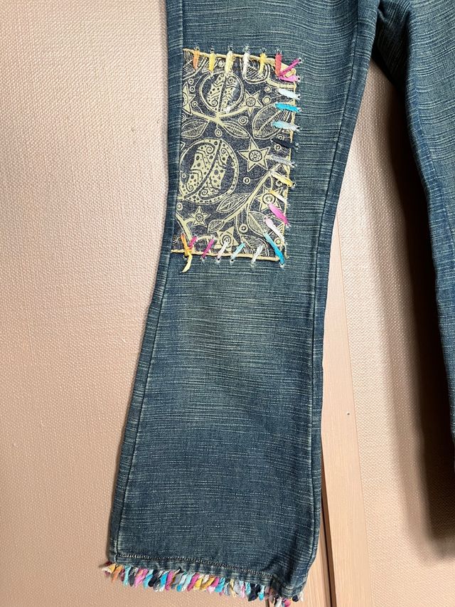 Jeans REPLAY ragazza in denim delavé con toppe