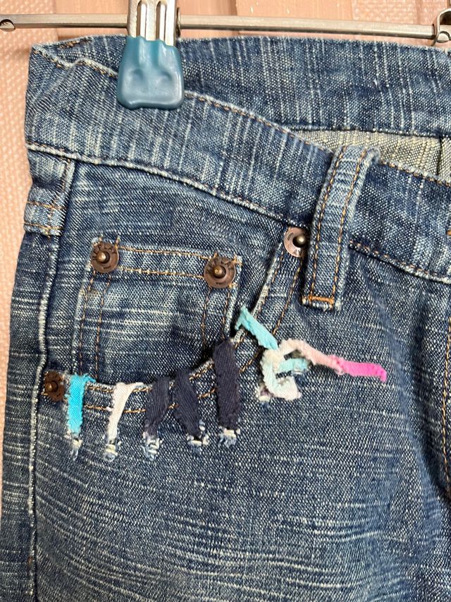 Jeans REPLAY ragazza in denim delavé con toppe