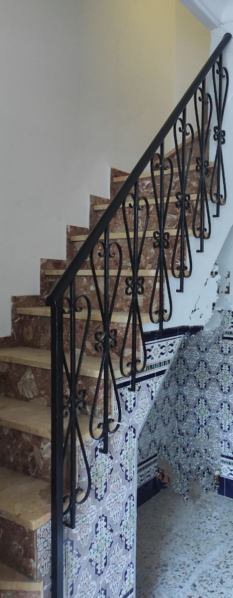 Baranda escalera.  