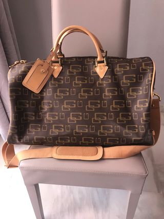 Maletín Guess de segunda mano en WALLAPOP