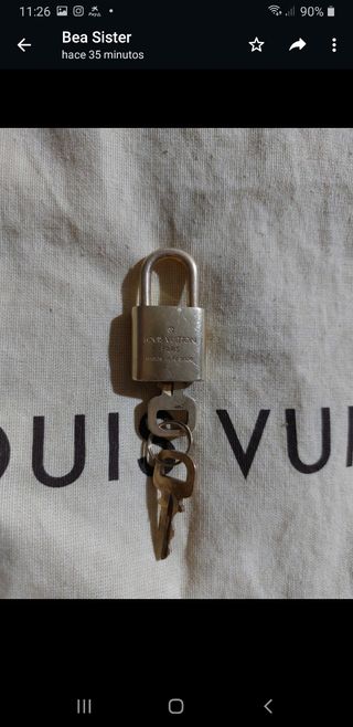 Candado Louis Vuitton original de segunda mano por 65 EUR en Rubí en  WALLAPOP