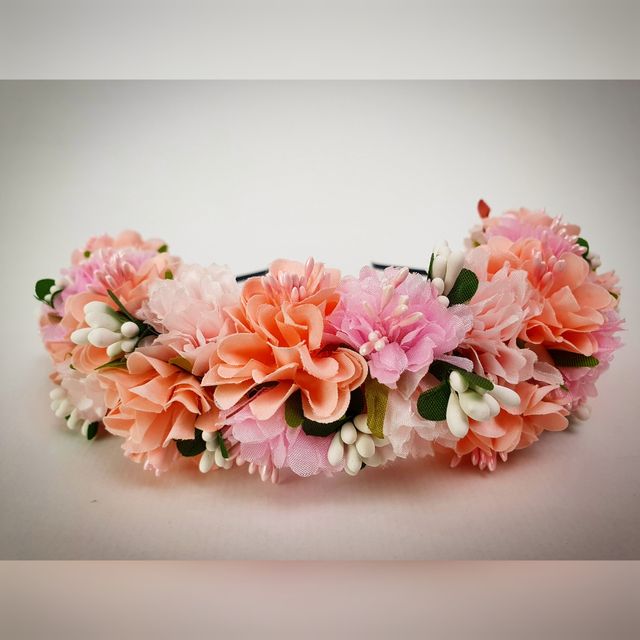 Corona flores rosa pastel