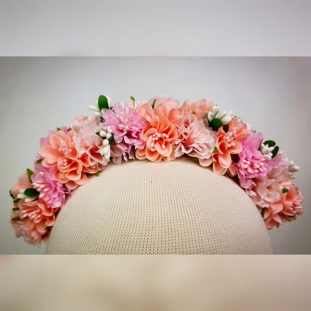 Corona flores rosa pastel