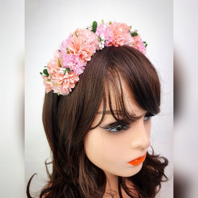 Corona flores rosa pastel