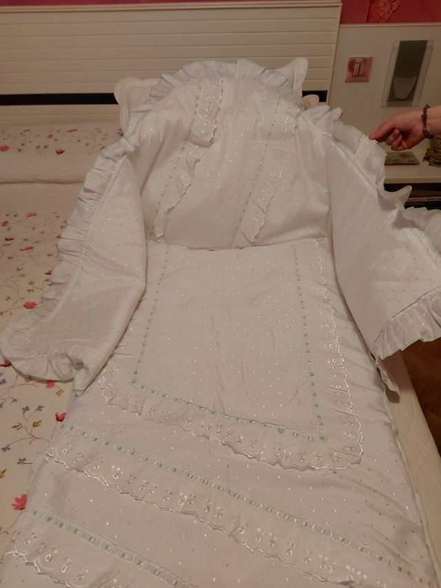 colcha cuna , saco