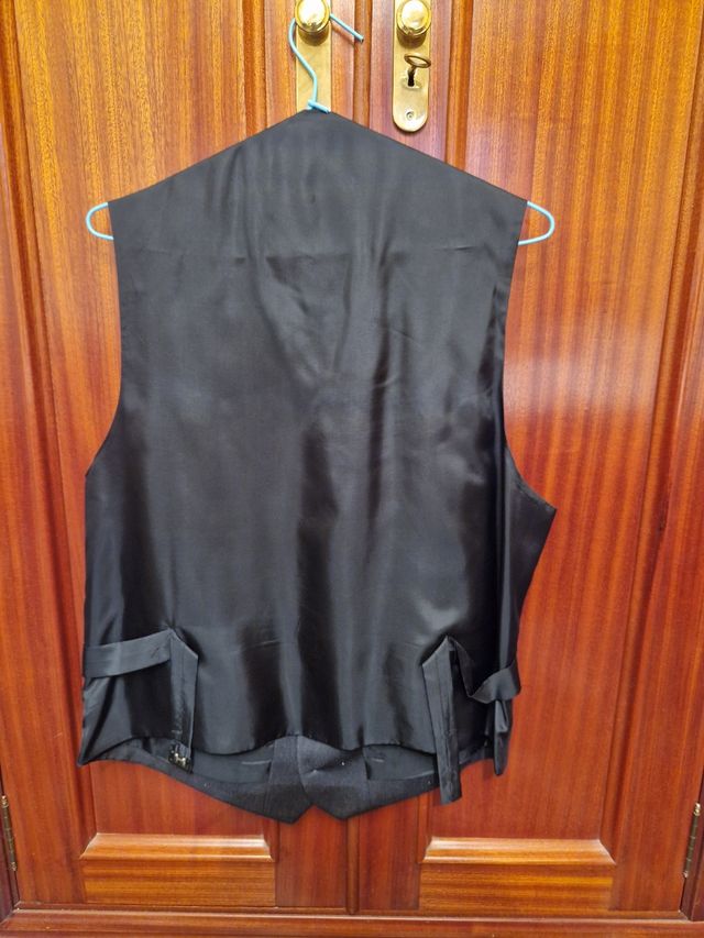 Traje de caballero.