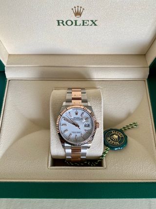 Reloj de oro Rolex de segunda mano en WALLAPOP
