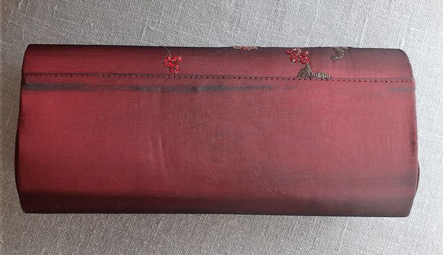 Bolso de fiesta tonos granates