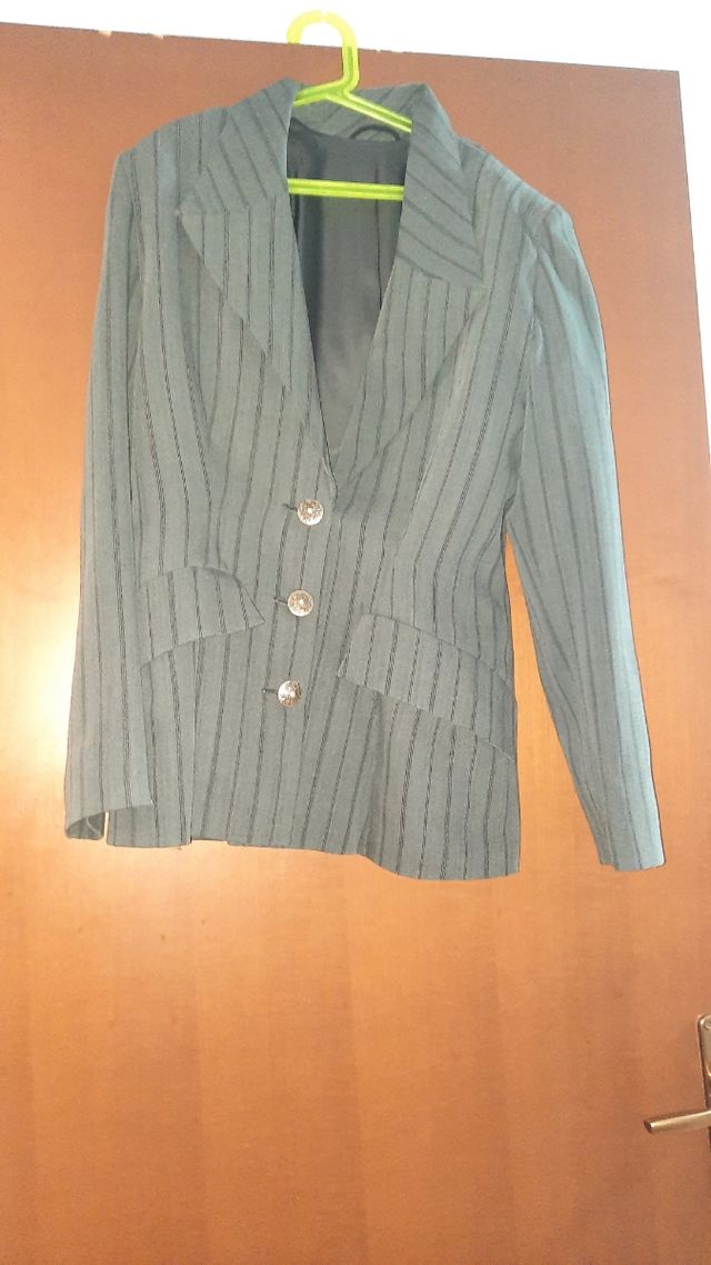 Cappotto verde abbinato con il pantalone 