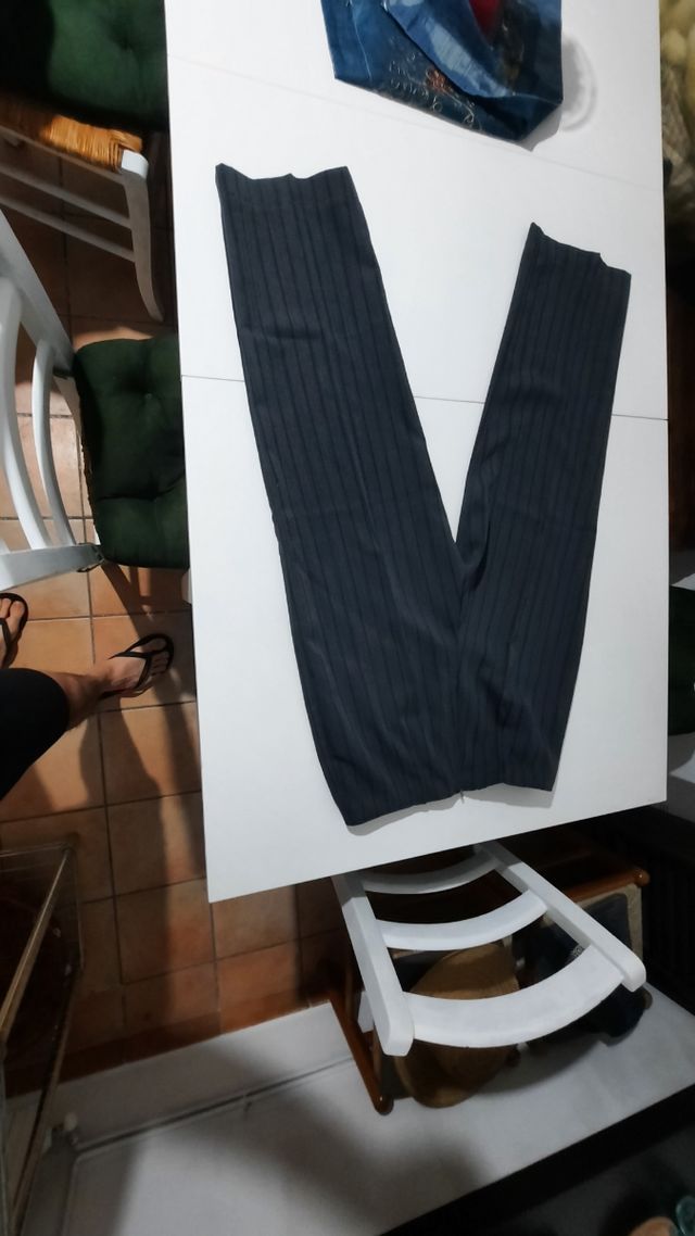 Cappotto verde abbinato con il pantalone 