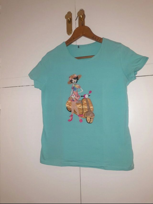 Camiseta muñeca y moto