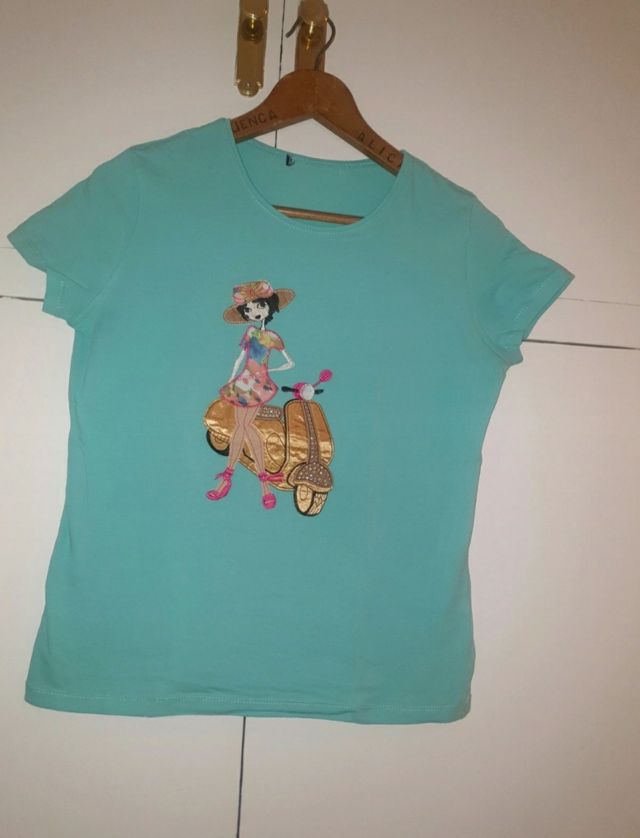 Camiseta muñeca y moto
