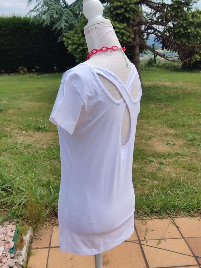 🌺Bonita camiseta blanca con tiras cruzadas en esp