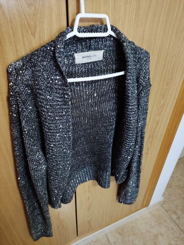 torera brillante y negra