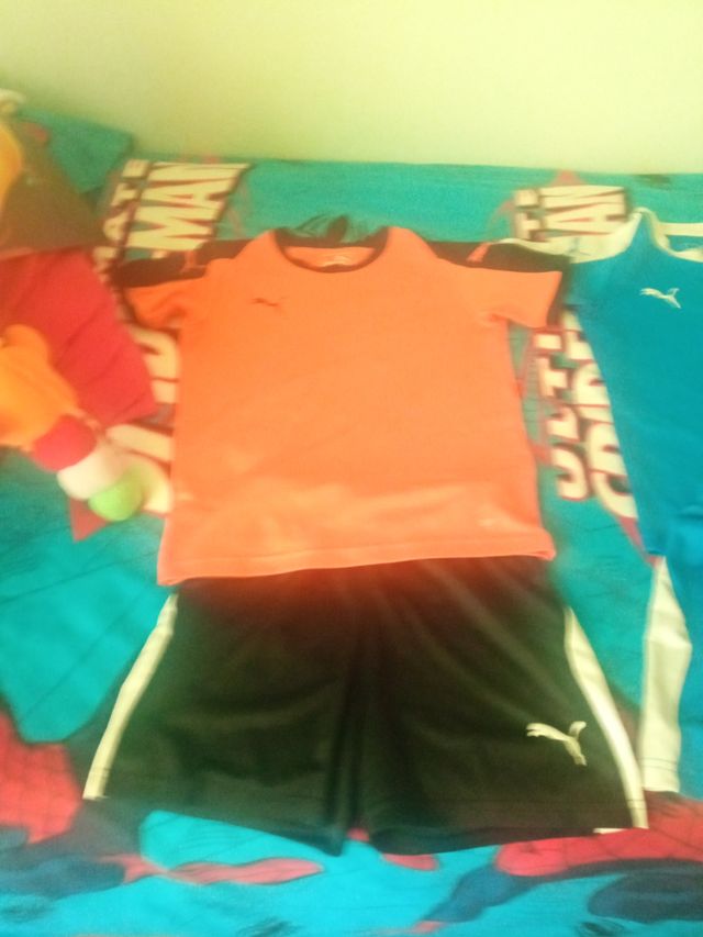 conjunto puma naranja y negro T:9-10