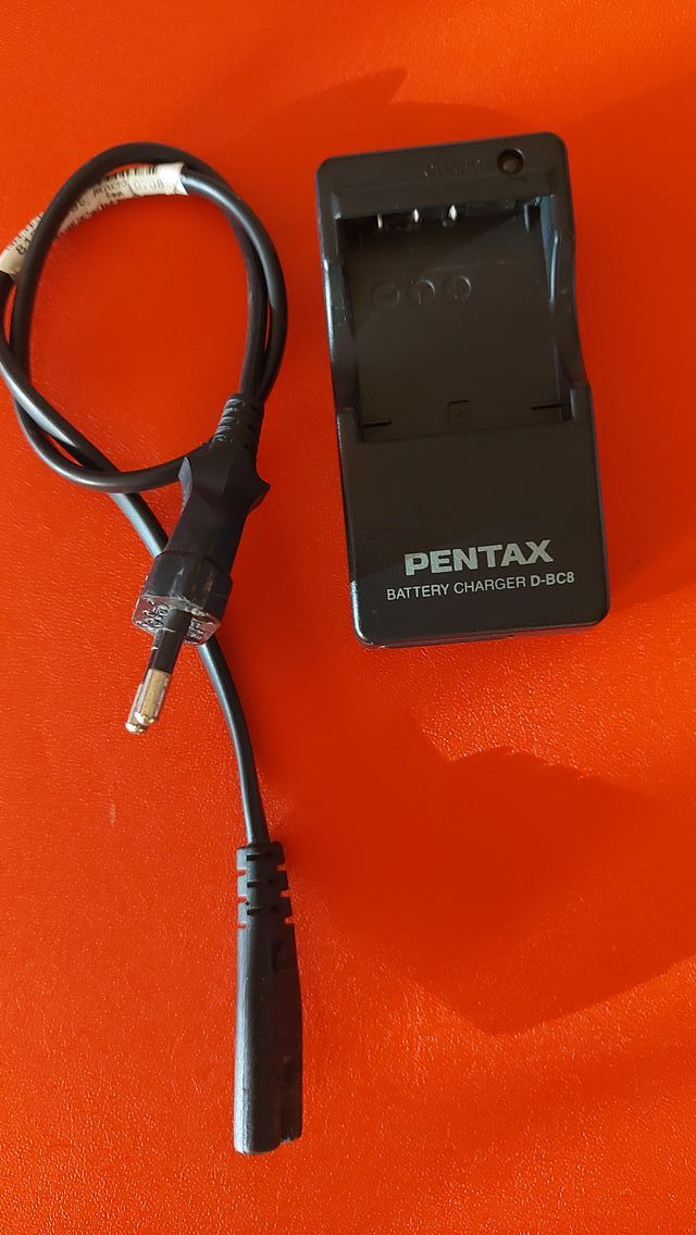 Cargador Pentax para cámara de fotos