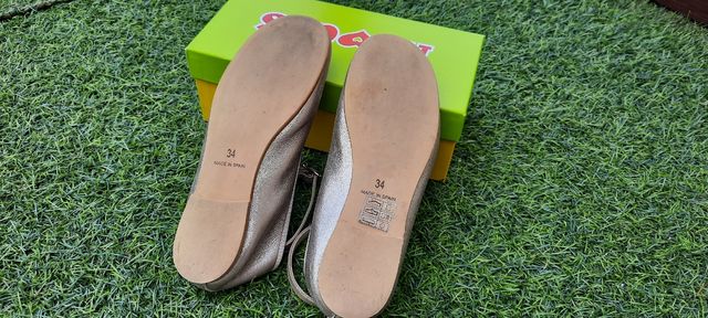 Zapatos tipo BAILARINAS de piel color oro viejo