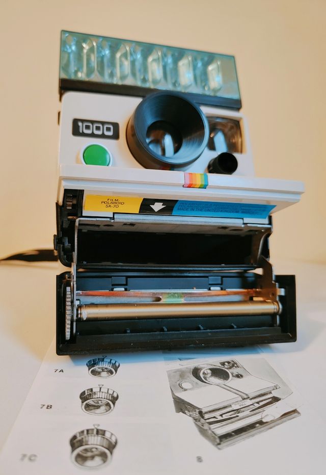 Polaroid Land 1000 con flah y manual
