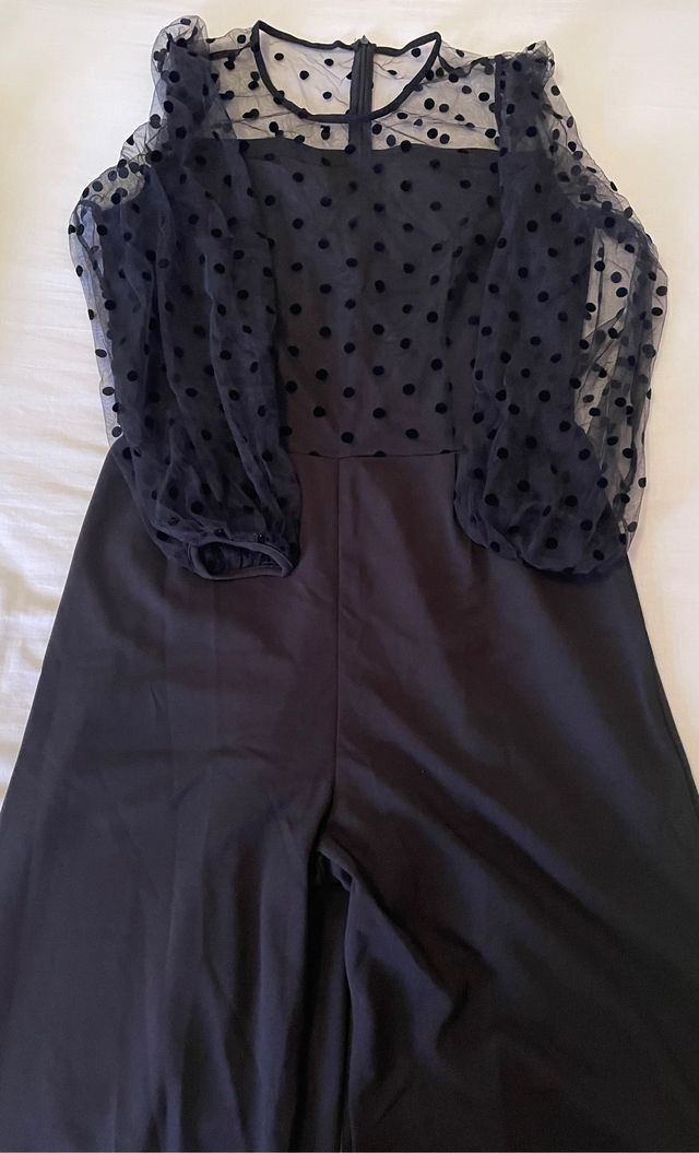 Mono negro de pierna ancha