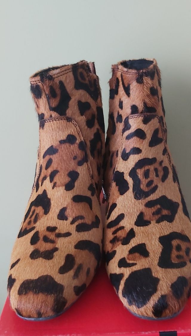 botas pelo leopardo.  precio original 84.95