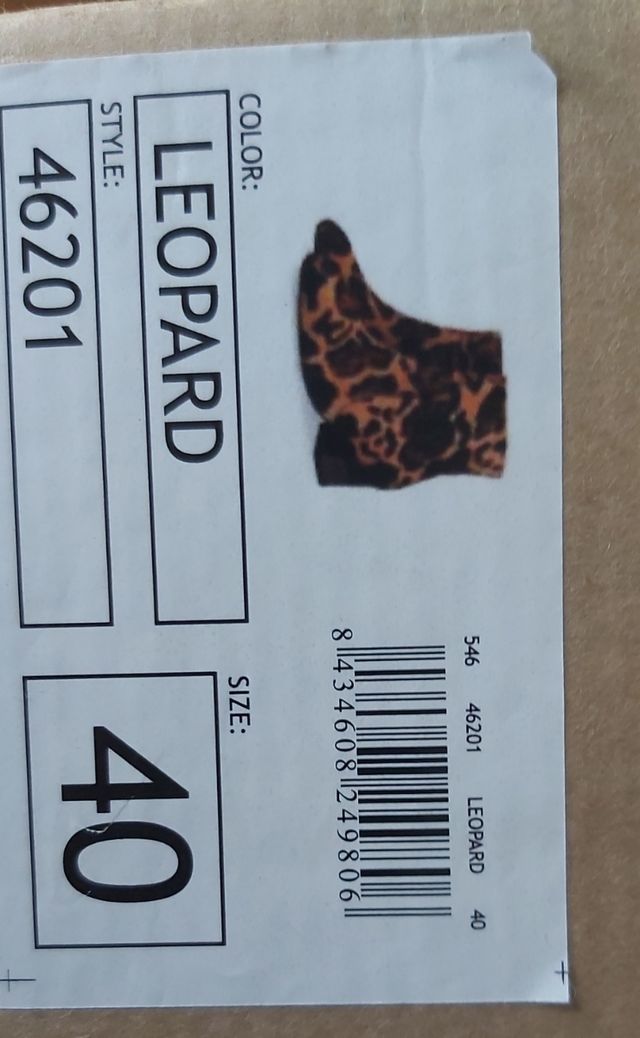 botas pelo leopardo.  precio original 84.95