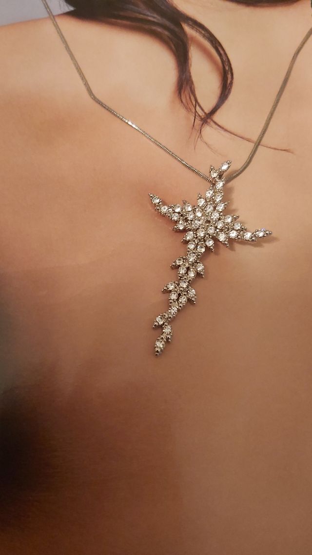 alta bigiotteria croce con pietre bianche