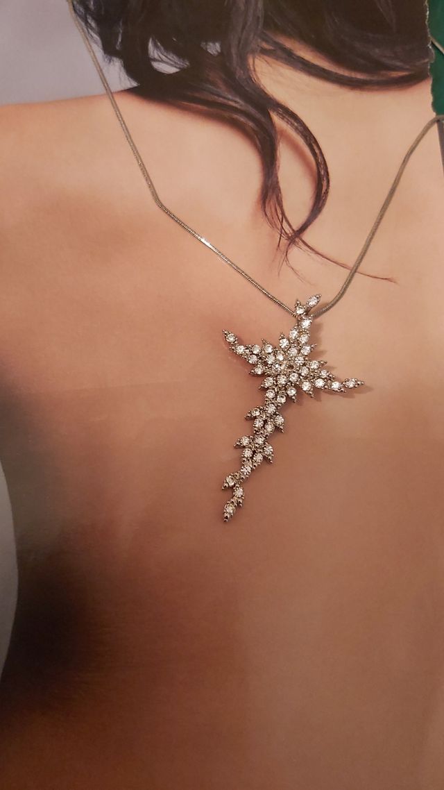 alta bigiotteria croce con pietre bianche