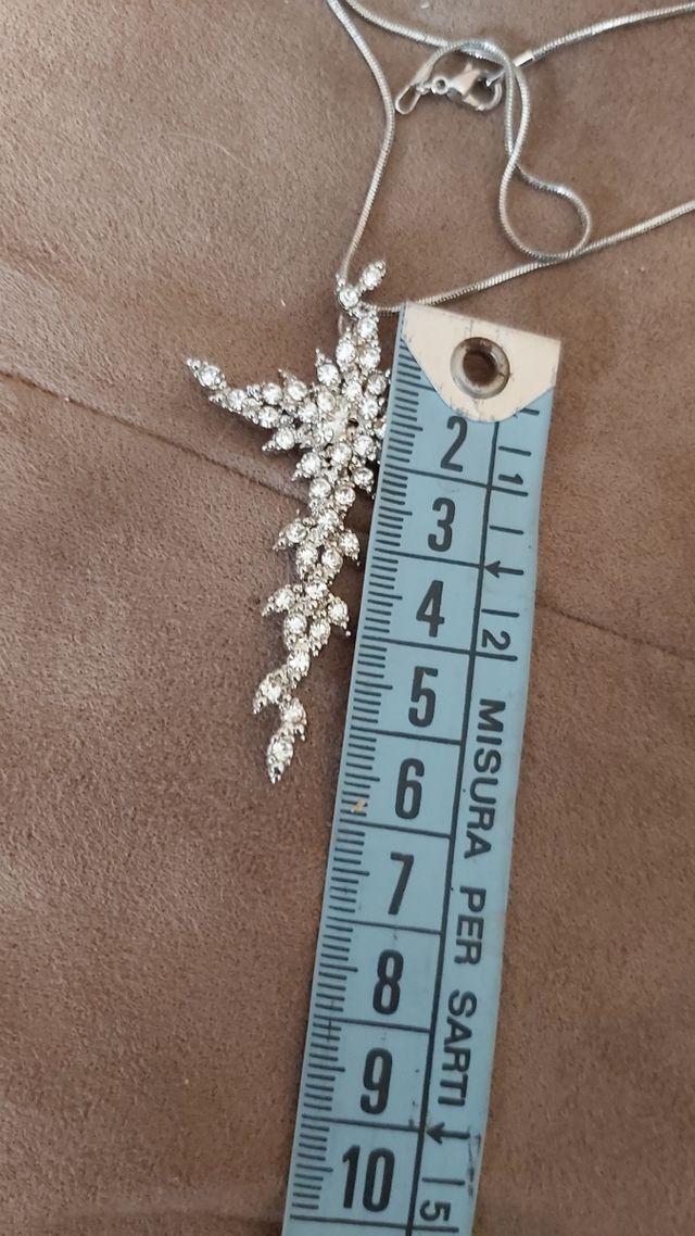 alta bigiotteria croce con pietre bianche