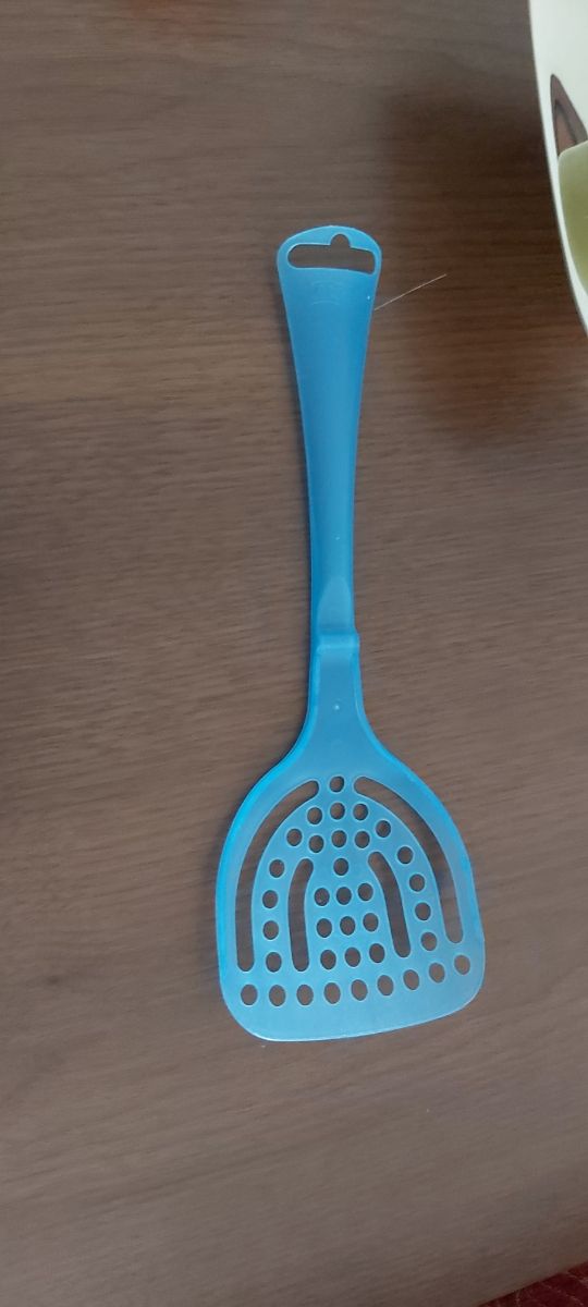 espatula limpia jaula y comedero