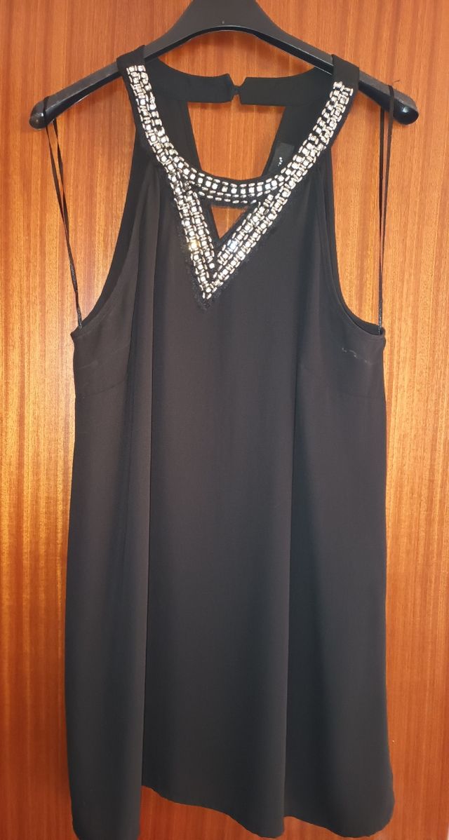 camisa con abalorios