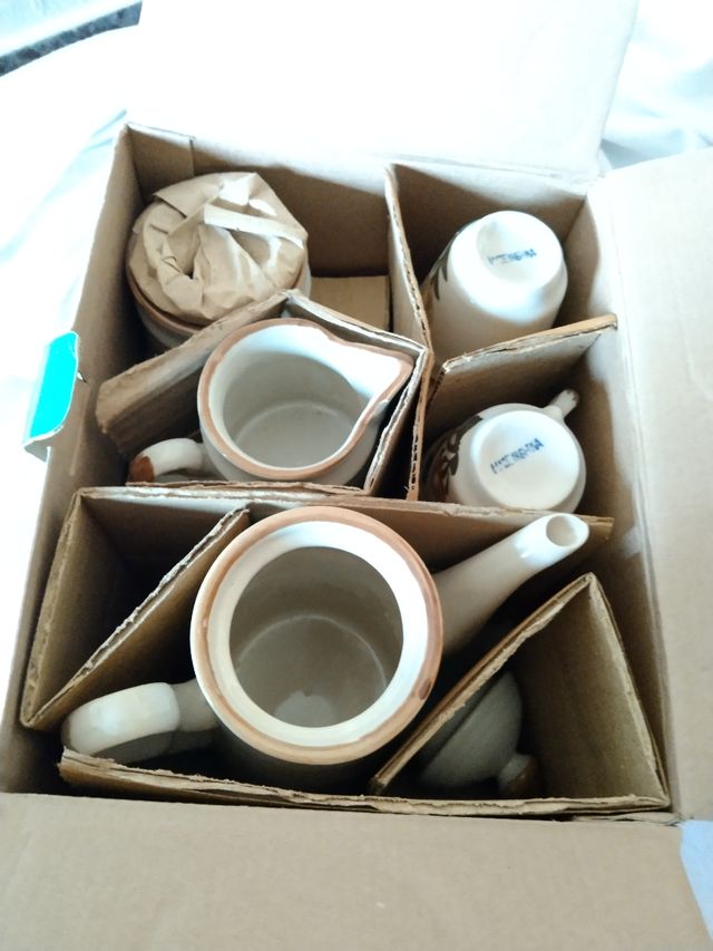 Juego de café de gres 15 piezas.