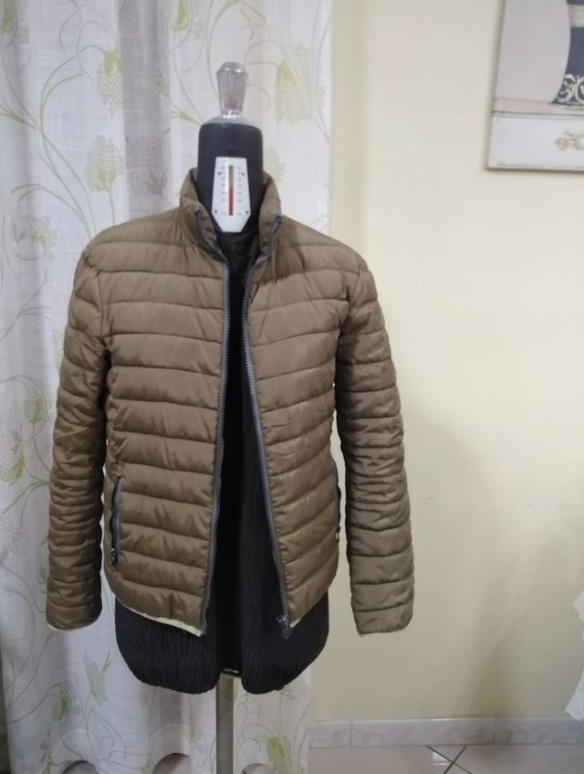 Giubbotto bambino marrone.