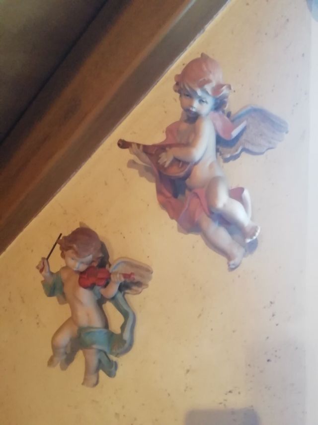 Ángeles con instrumentos musicales