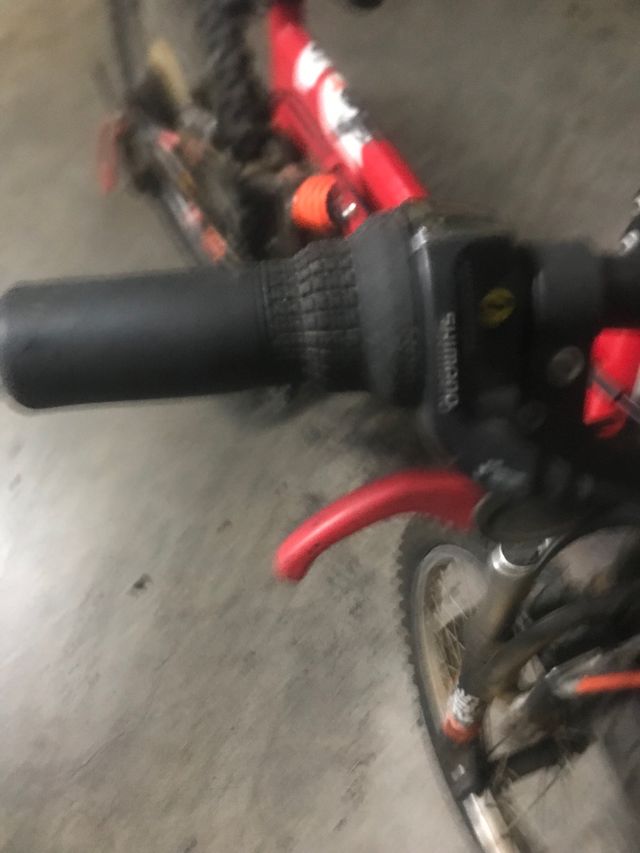 Bicicleta 21" cambio shimano puño doble suspensión