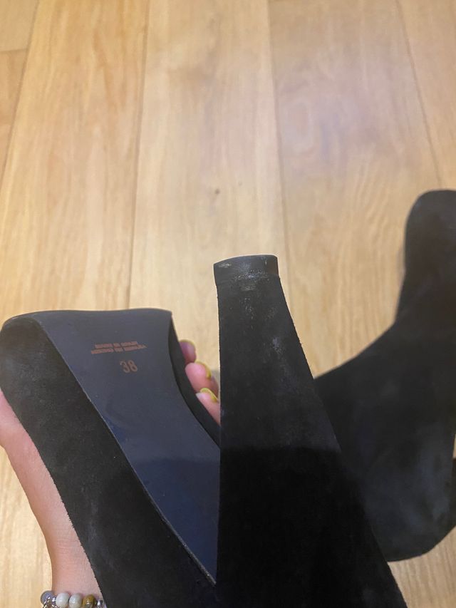 Botines tacòn y plataforma delantera. Piel.