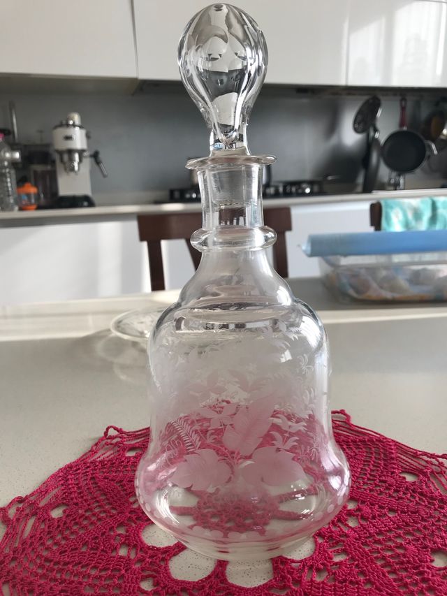 Bottiglia con sottopiatto