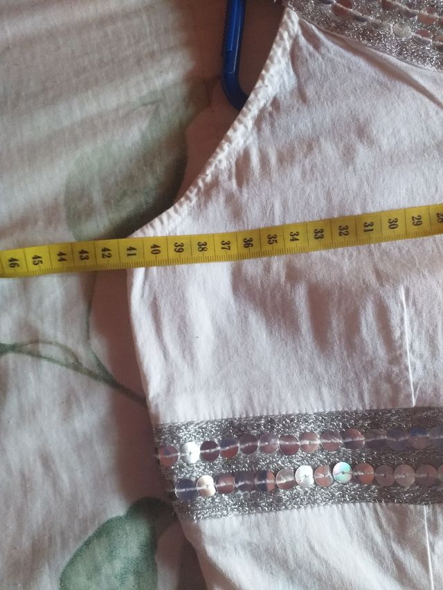 abito bianco con paillettes