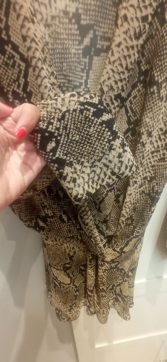 Camisa muy fins animal print de Zara, talla M