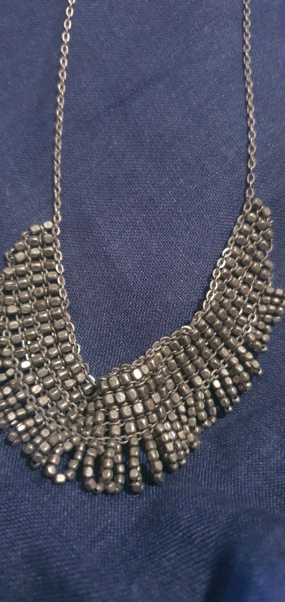 girocollo acciaio antichizzato.