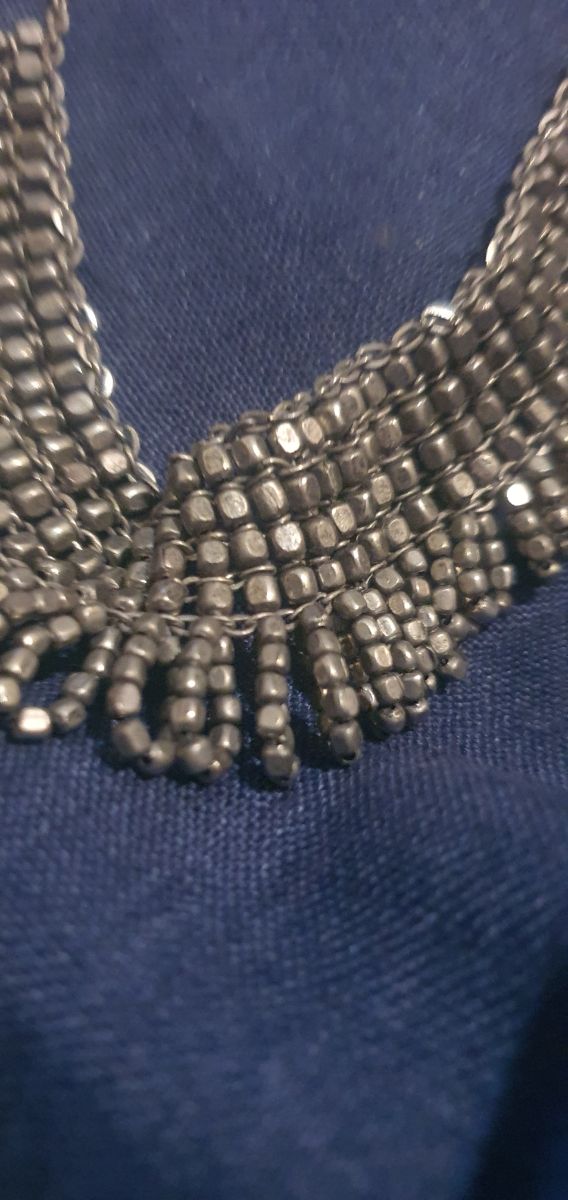 girocollo acciaio antichizzato.