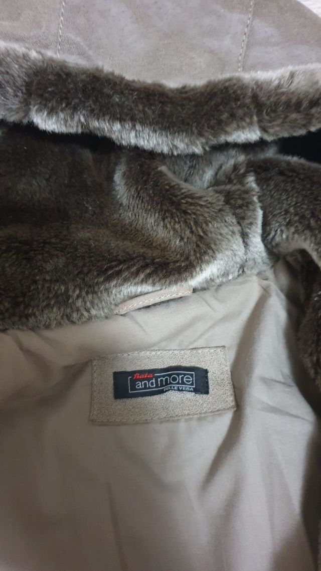 Giubbotto e stivali da donna, in vera pelle.