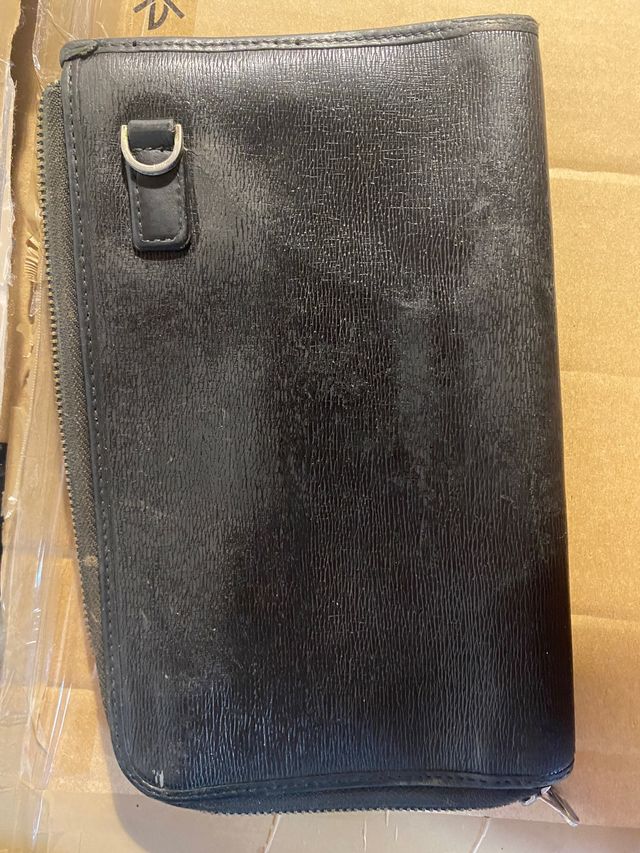 Monedero negro de piel - Elegante y práctico