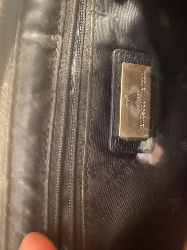 Monedero negro de piel - Elegante y práctico