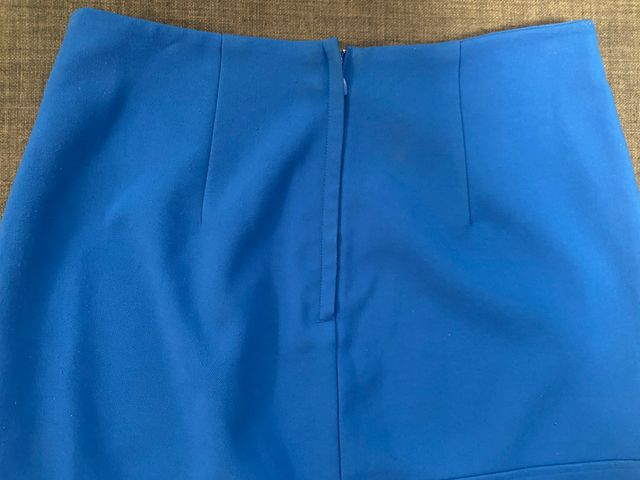 Minifalda ajustada de tela azul H & M talla 38