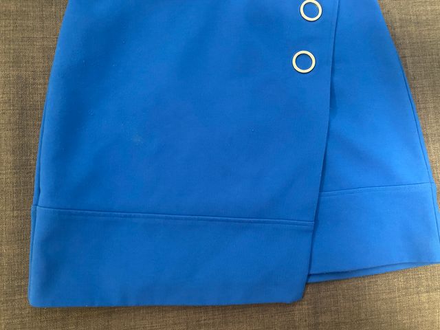 Minifalda ajustada de tela azul H & M talla 38