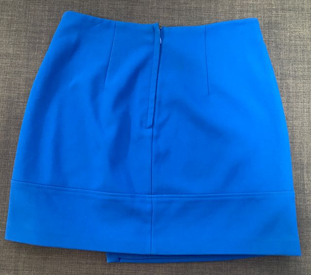 Minifalda ajustada de tela azul H & M talla 38