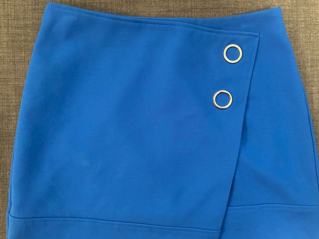 Minifalda ajustada de tela azul H & M talla 38